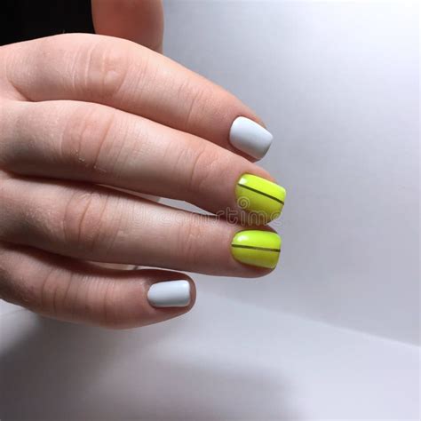 Yellow Manicure on the Nails. Yellow Nail Design on the Fingers Stock ...