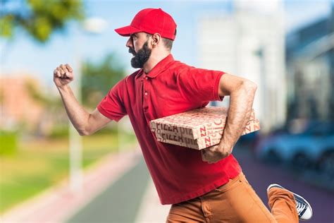 Premium Photo Pizza Delivery Man Running Fast On Unfocused Background