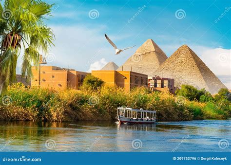 Pyramids near Nile River stock photo. Image of landscape - 209753796