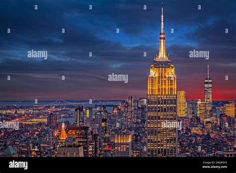 City Skyline With Empire State Building And World Trade Center Hi Res