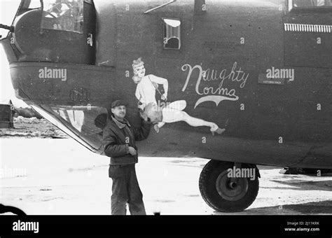 B24 Bomber with crewman by Nose art Stock Photo - Alamy