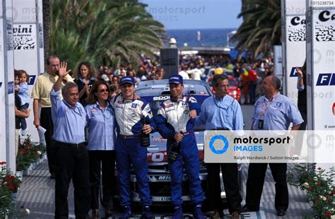 Rally Winners Gilles Panizzi FRA Centre Right And Co Driver Herve