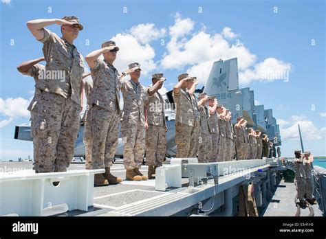 U S Marines And Sailors Render Honors Aboard The Amphibious Assault