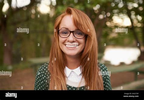 Portrait Of An Attractive Teenage Girl Standing In The Outdoors Stock