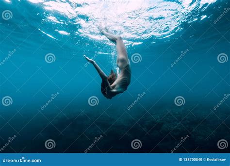 Naked Slim Woman Dive Underwater In Ocean Stock Photo Image Of Bali Pool