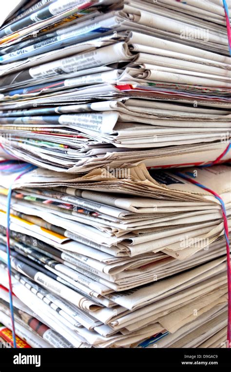 Pile Of Magazines And Newspapers Packed And Ready For Recycling Stock