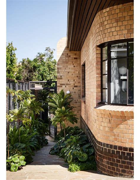 An Art Deco Renovation That Champions Brick Waterfall House Clinker