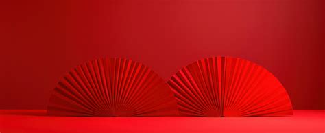 ai generated  red fan designs sitting   red background