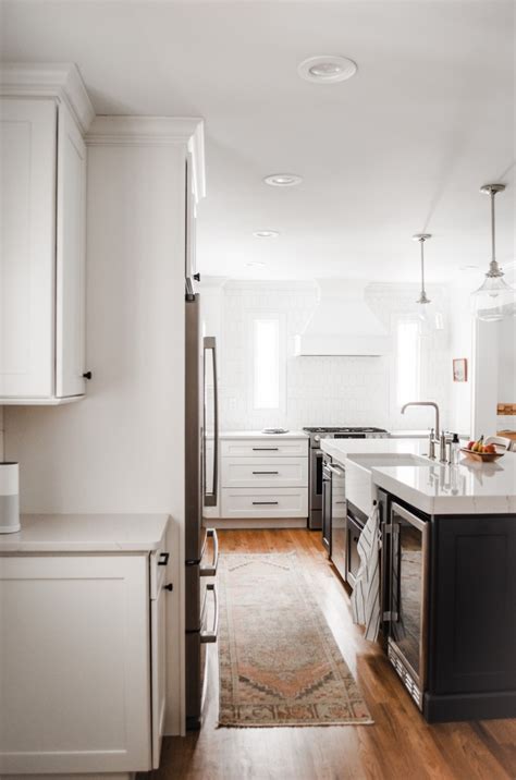 white kitchen with white farmhouse sink - Lovely Lucky Life