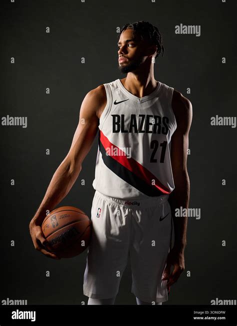 Portland Trail Blazers Guard Rayan Rupert Poses For Photos During The
