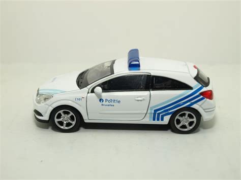 Coche Autos Policia Welly Opel Astra Gtc Belgica