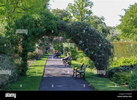 People Sitting In Botanic Gardens Belfast Hi Res Stock Photography And