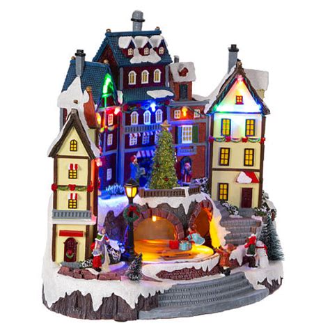 Snowy Christmas village animated tree 30x30x20 cm | online sales on ...