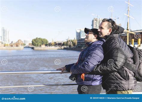 Tourist Gay Couple Posing In Puerto Madero Buenos Aires Stock Photo Image Of America Holding
