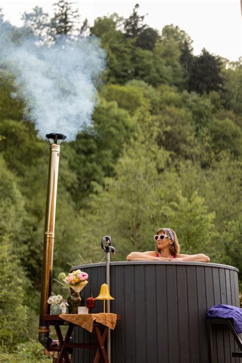 Woman Resting On Nature In Wooden House With Hot Tub Stock Image Image Of Reading Relax