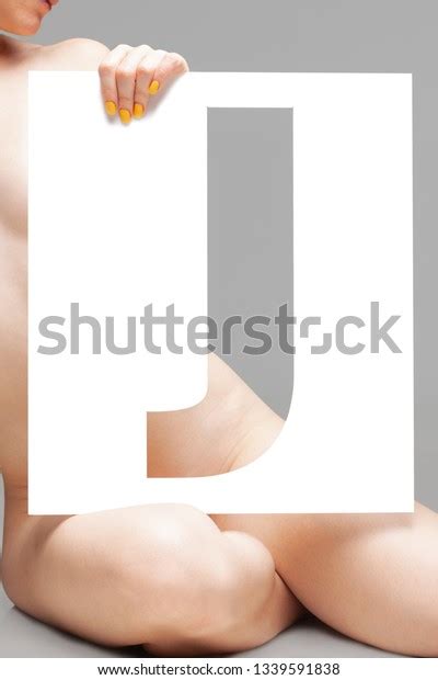 Nude Female Body Behind Stencil Letter Stock Photo Shutterstock