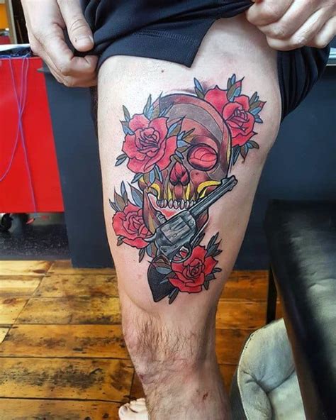 Gun And Roses Tattoo On Thigh