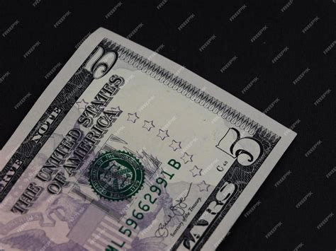 Premium Photo | Detail of 5 us dollar bill