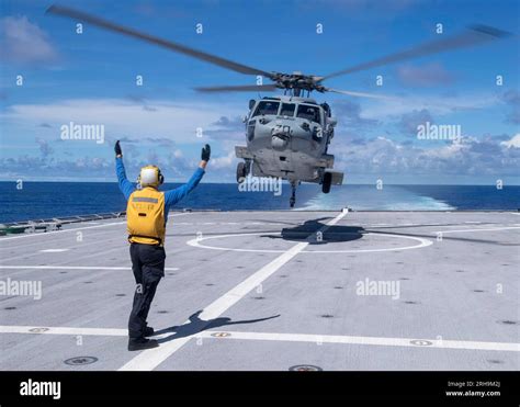 An MH 60S Sea Hawk On The Flight Deck USS Manchester Pacific Ocean