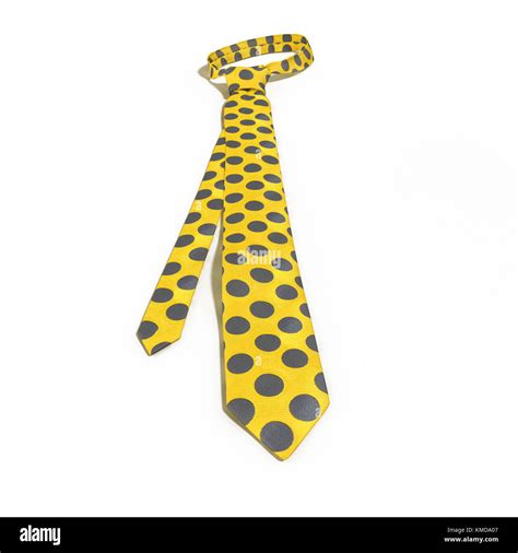 Yellow tie with dotted pattern isolated on white. 3D illustration Stock Photo - Alamy