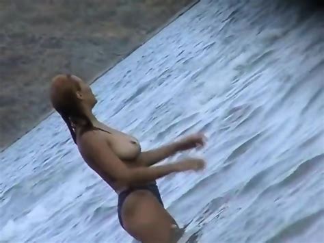 Spycam On Beach Records Amateurs Topless And Also Nude