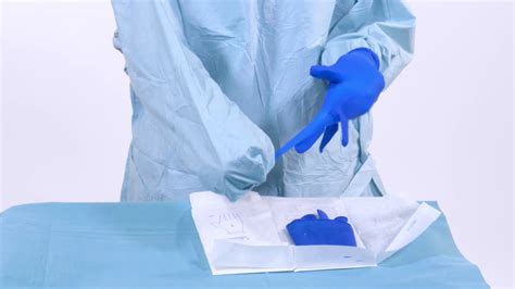 How To Don The Biogel Surgical Glove With The Closed Technique Cuff In Hand Method Youtube