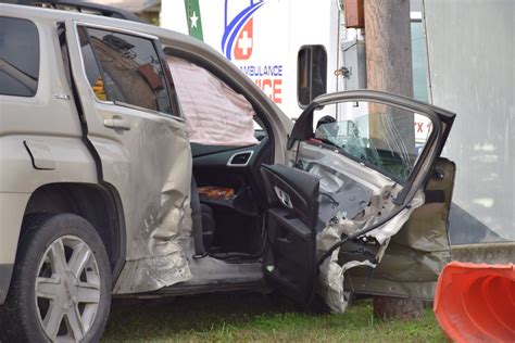 Woman Hospitalized After Ambulance Crashes Into Her Car On Northeast Side