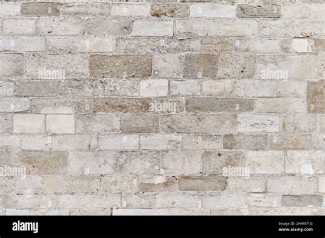 Stone brick wall surface background Stock Photo - Alamy