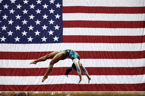 Simone Biles Just Made History With a Jaw-Dropping Beam Dismount | Glamour