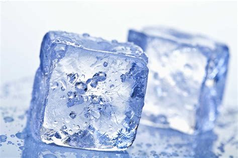 Ice Cubes Against White Background Close Up Stock Photo