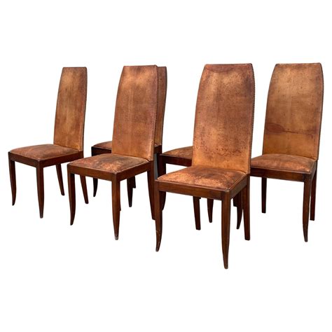 Leather and Wood Dining Chairs at 1stDibs