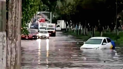 Inundaciones en Estado de México Tormenta Deja Vehículos Varados en