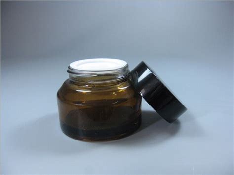 50g amber glass jars with black lids supplier: Baolinglass.com