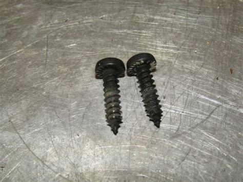 Buick Lacrosse Oem Sun Visor Or Clip Retainer Screw Set