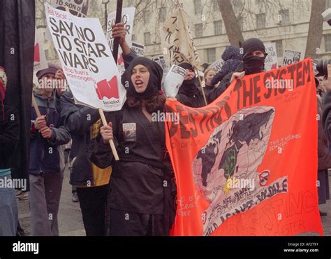 Marching Protester During Anti Globalisation March Through London