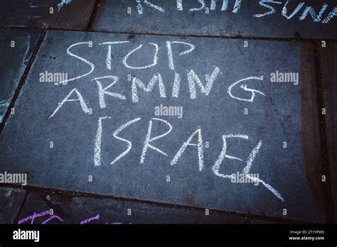 Protester Painted Stop Arming Israel With Chalk On The Street During