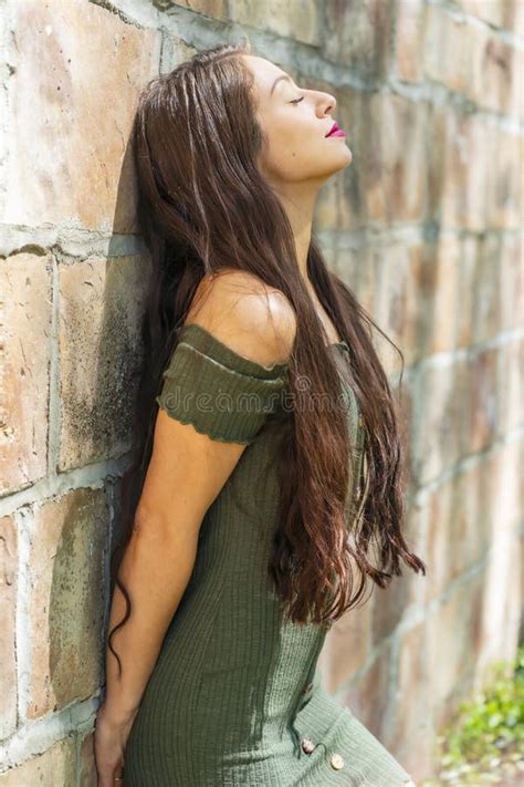 A Lovely Brunette Model Enjoys An Spring Day Outdoors Stock Photo Image Of Girl Female