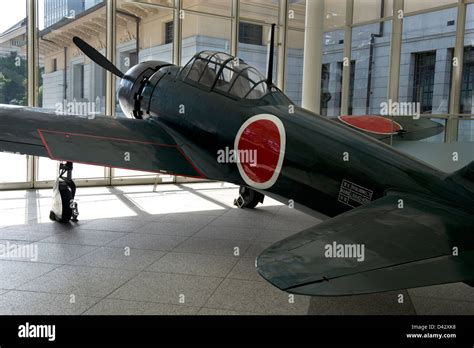 World War Ii Mitsubishi A6m Zero Fighter Plane On Display In The Lobby