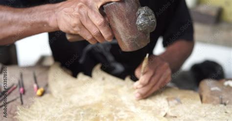 Process of making Wayang shadow puppet. Wayang kulit is a traditional ...