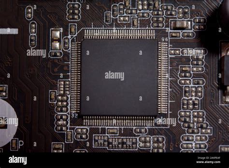 Close Up Blank Microchip On Electronic Circuit Board Stock Photo Alamy