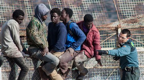 Immigrants Rush The Spanish Border Photos