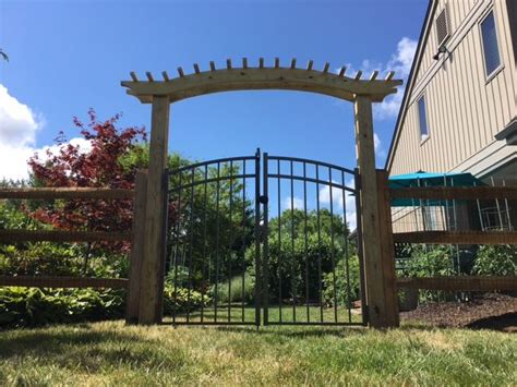 A Beautiful Custom Built Arch Top Arbor With A Double Rainbow Arch