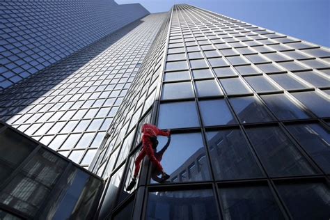 'French Spiderman' climbs Paris skyscraper to mark turning 60 ...