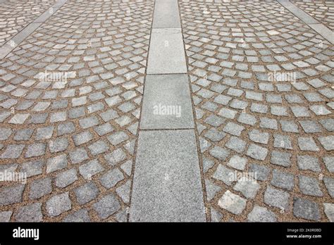 New Paving Made With Grey Stone Slabs And Small Stone Cube Blocks