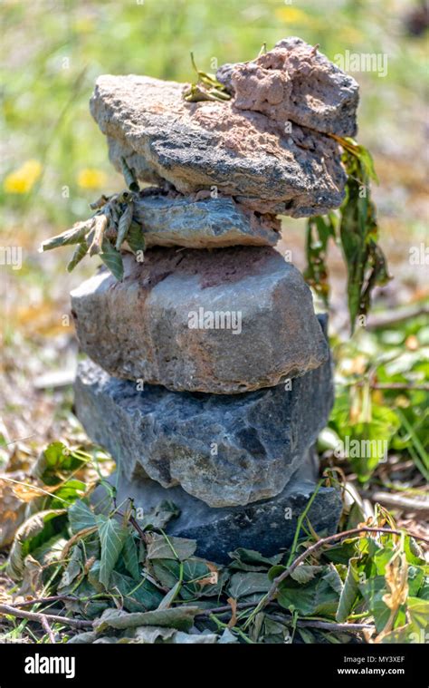 Some Different Sized Stones Stacked On Top Of Each Other Stock Photo