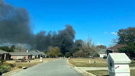 Multiple Agencies Battle House Fire In Pace Neighborhood