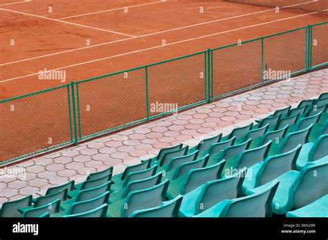 Green Grandstand Seats And Tennis Court Stock Photo Alamy