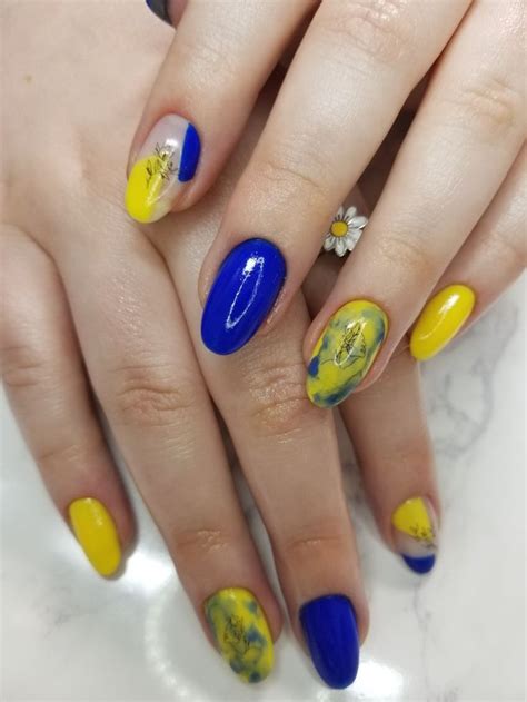 Blue and yellow nail design idea 💅🏼 💙💛 | Yellow nails design, Nail ...