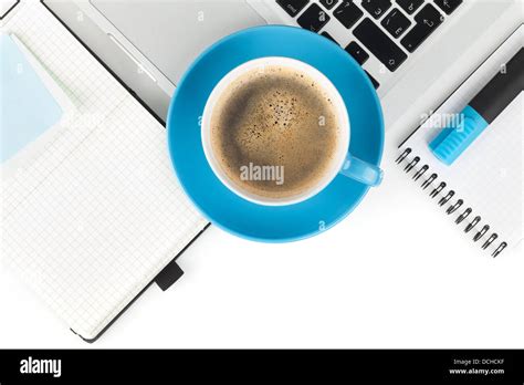 Coffee Cup And Office Supplies View From Above On White Background