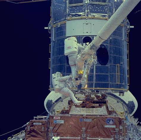 Esa The Sts Crew Servicing The Hubble Space Telescope While Docked